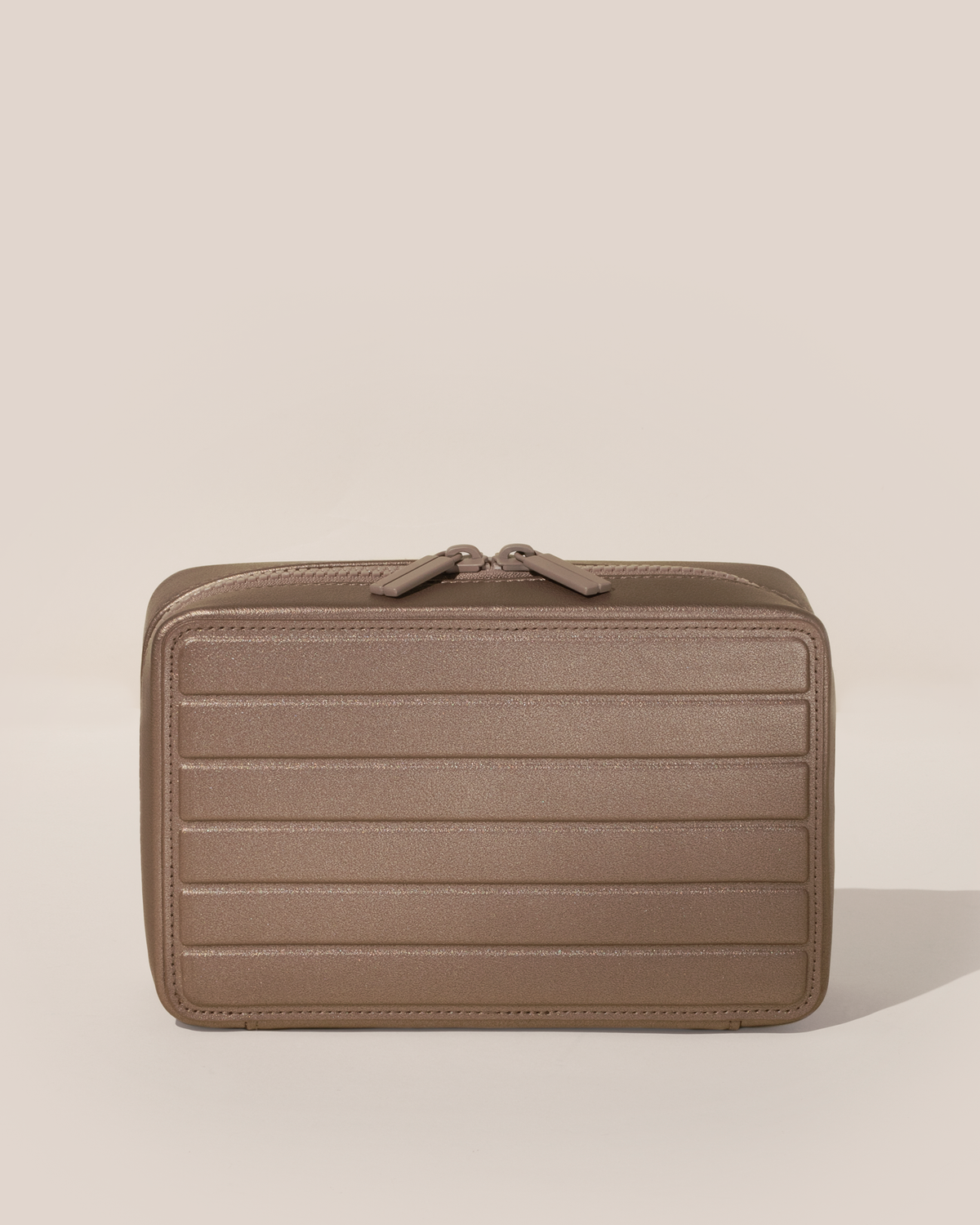 Closed Afform Large Bronze Vault jewelry case with a compact, zip-around design for elevated jewelry organization