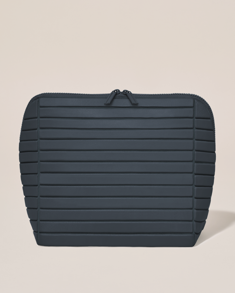 Closed Afform Large Indigo (navy) Traveller makeup bag with structured horizontal bar design