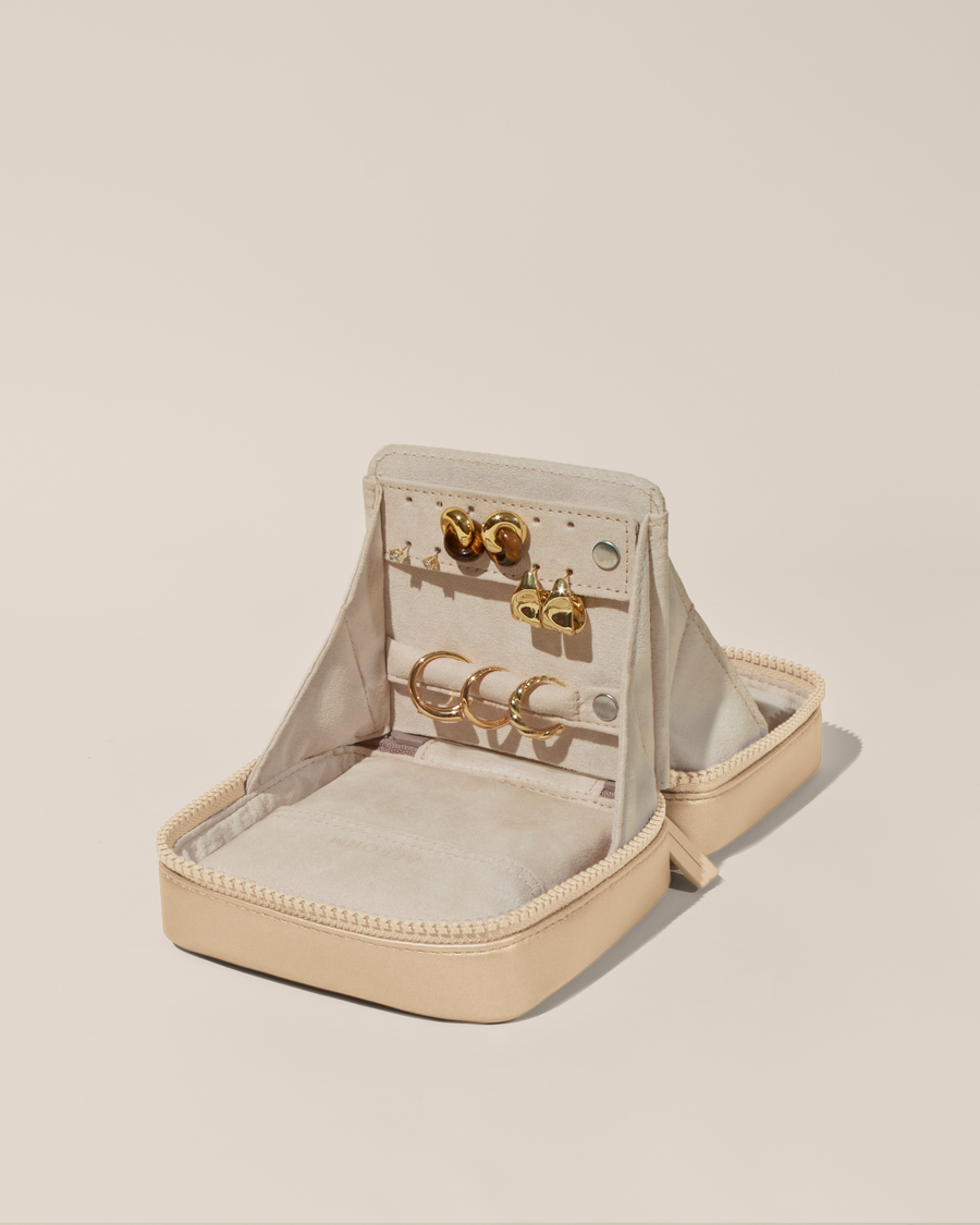 Open Afform Small Bisque (white) Vault, shown open and packed with rings and earrings on respective removable ring and earring bars.