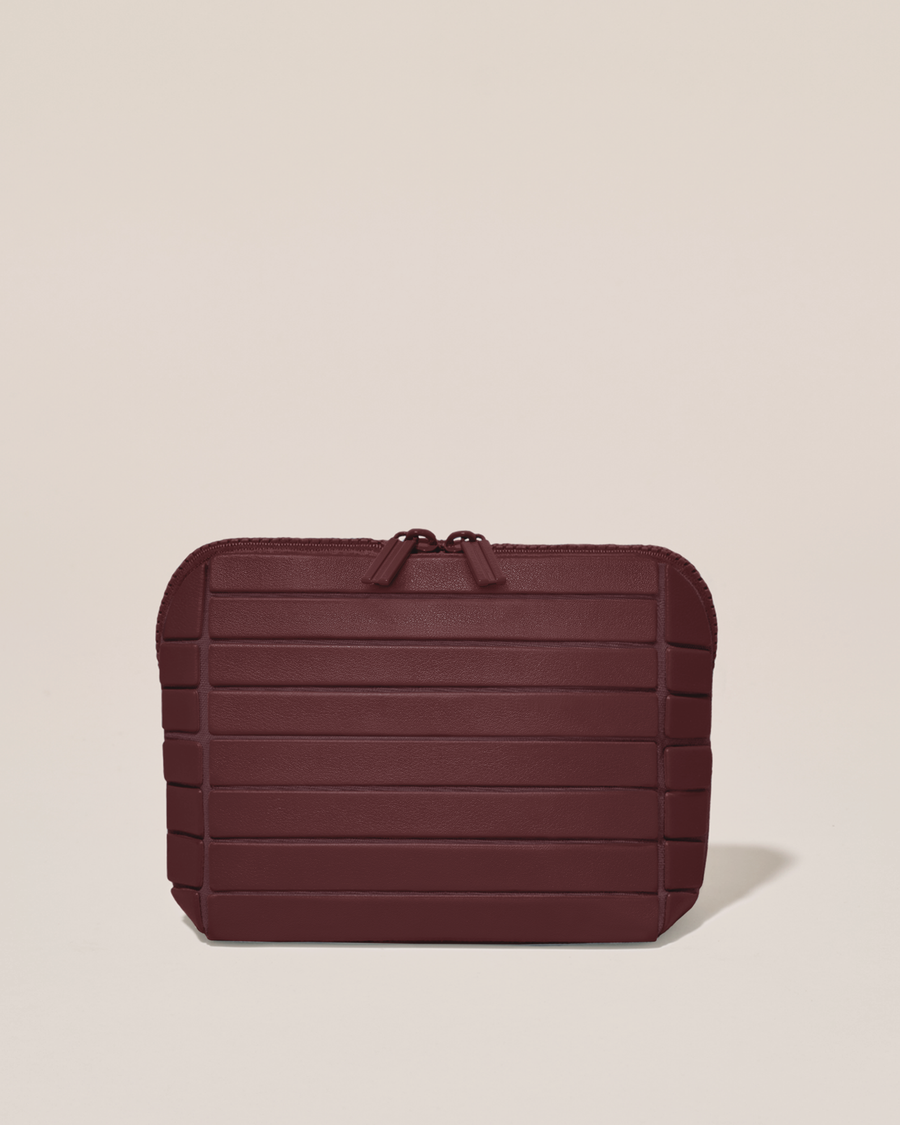 Closed Afform Small Cassis (maroon) Traveller makeup bag with structured horizontal bar design