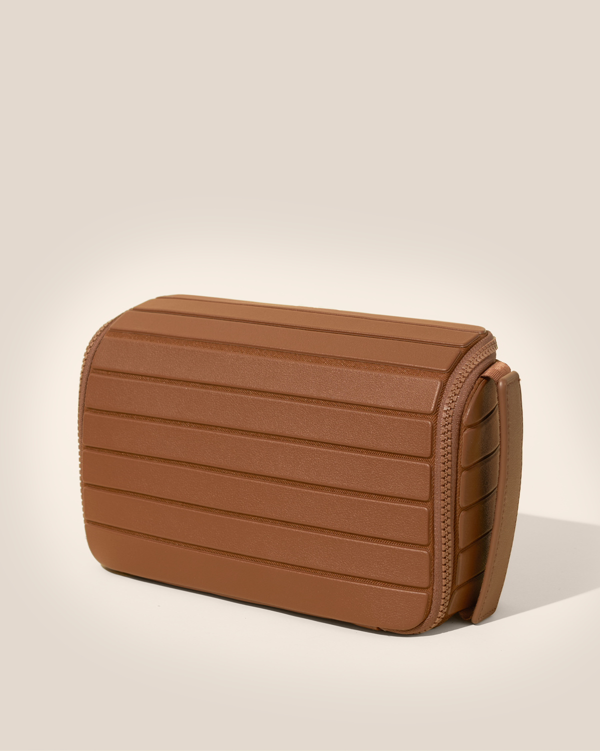 Closed Afform vicuna (brown) Tech Kit electronics organizer, exterior view showing structured silhouette and carry handle