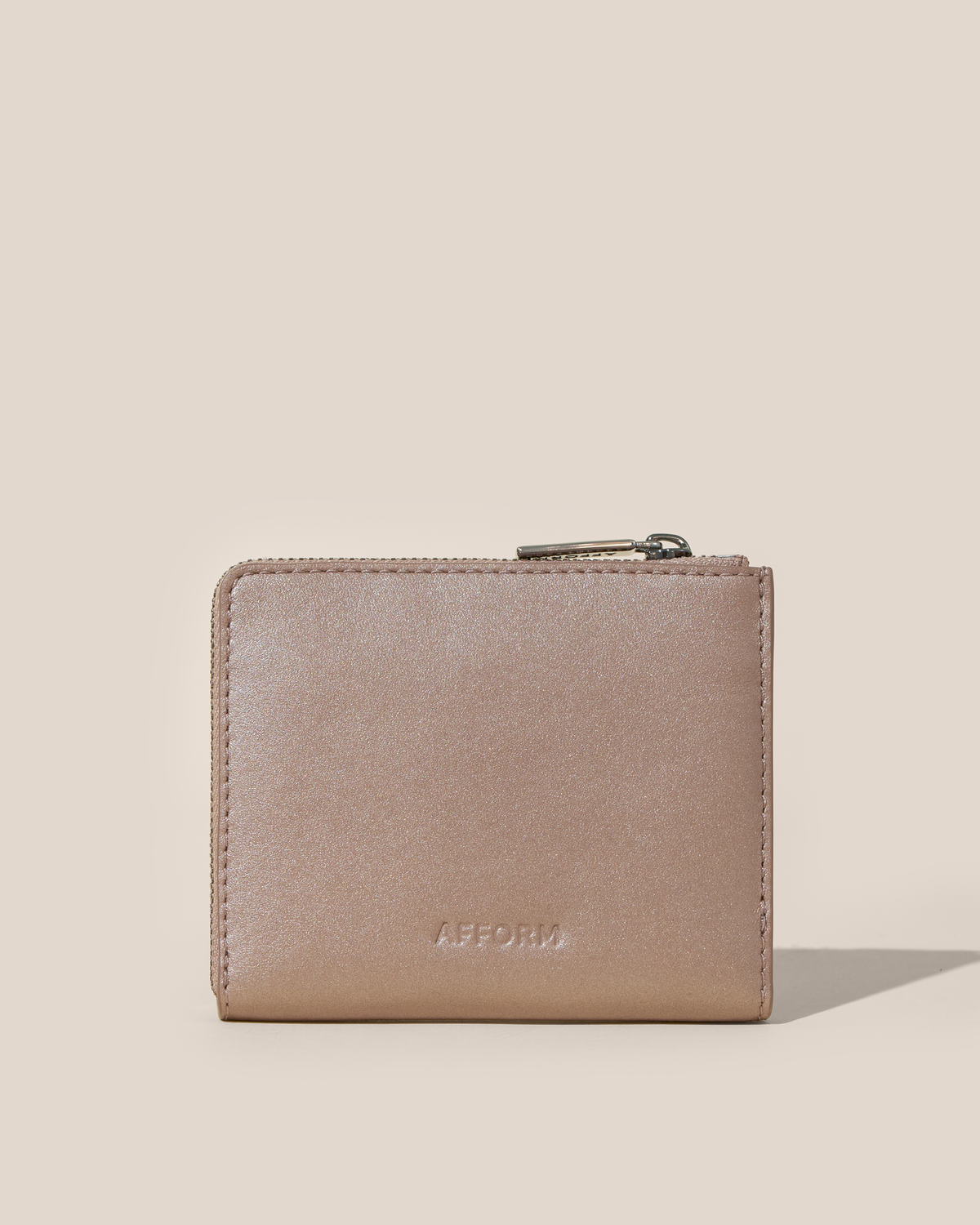 Back of the Afform Bronze Zip Wallet showing a smooth finish and embossed Afform logo