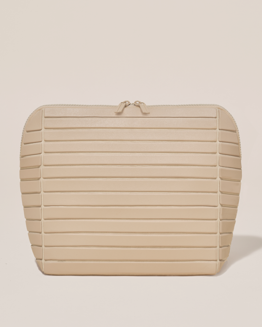 Closed Afform Large Bisque (white) Traveller makeup bag with structured horizontal bar design