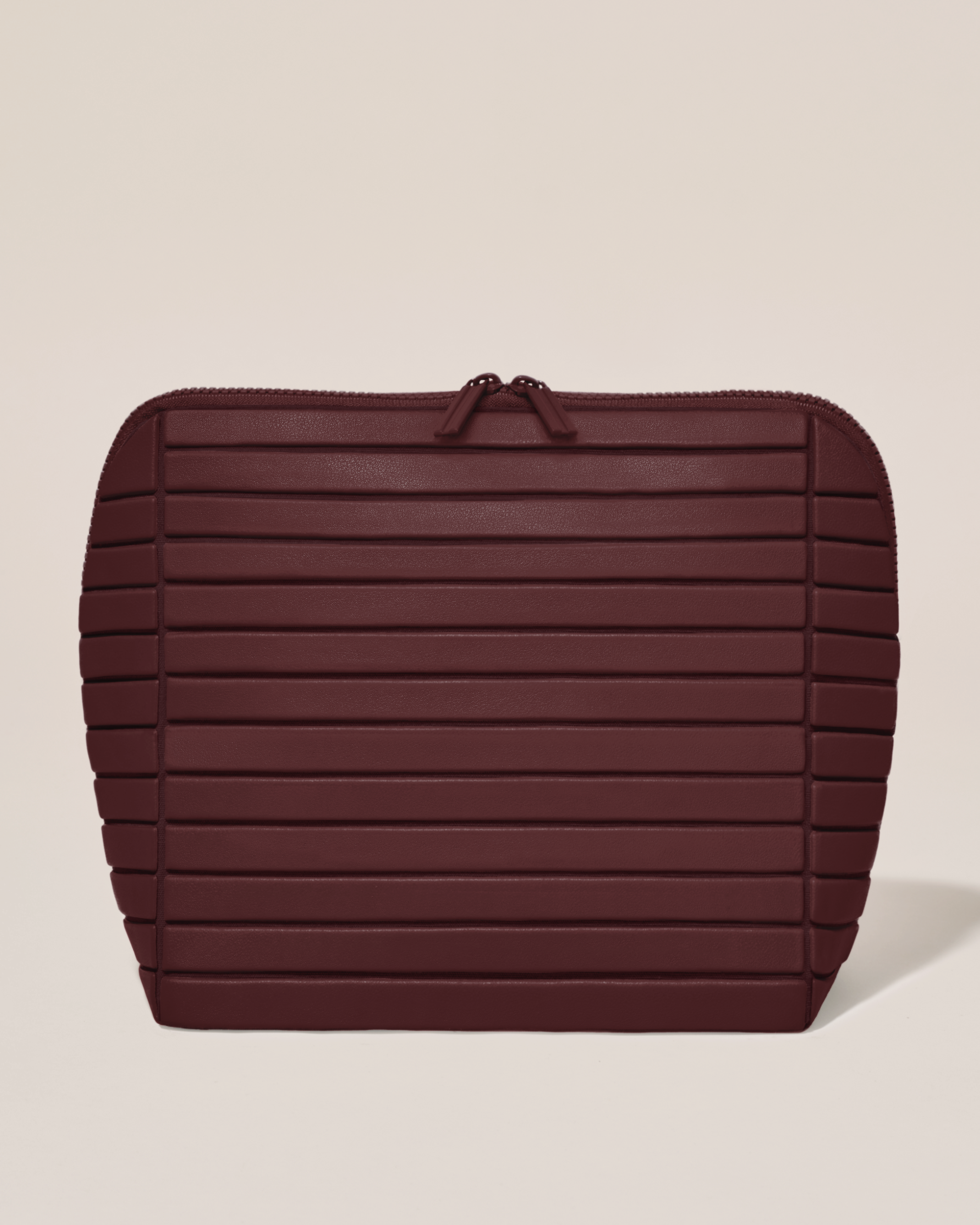 Closed Afform Large Cassis (maroon) Traveller makeup bag with structured horizontal bar design