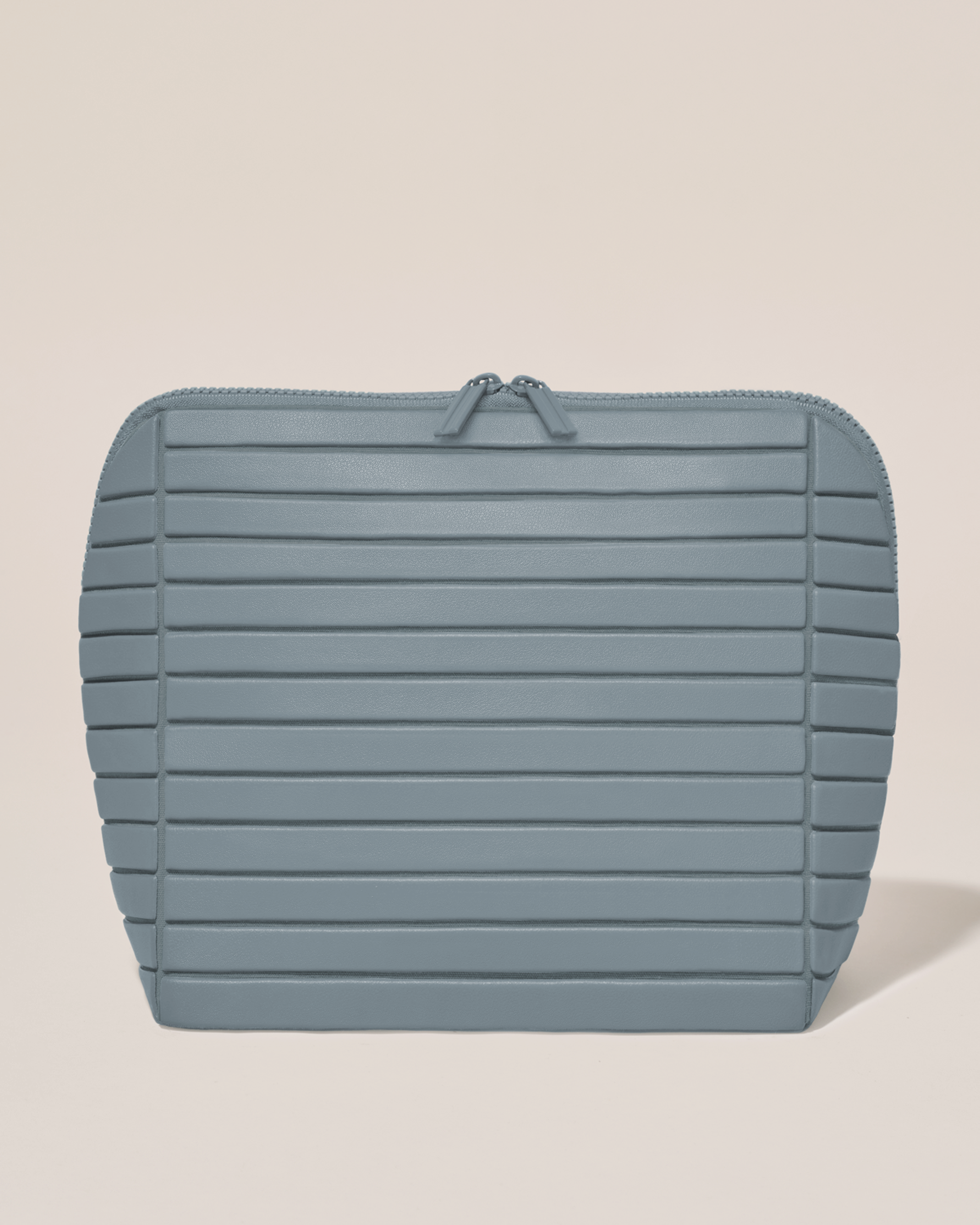 Closed Afform Large Slate (blue) Traveller makeup bag with structured horizontal bar design