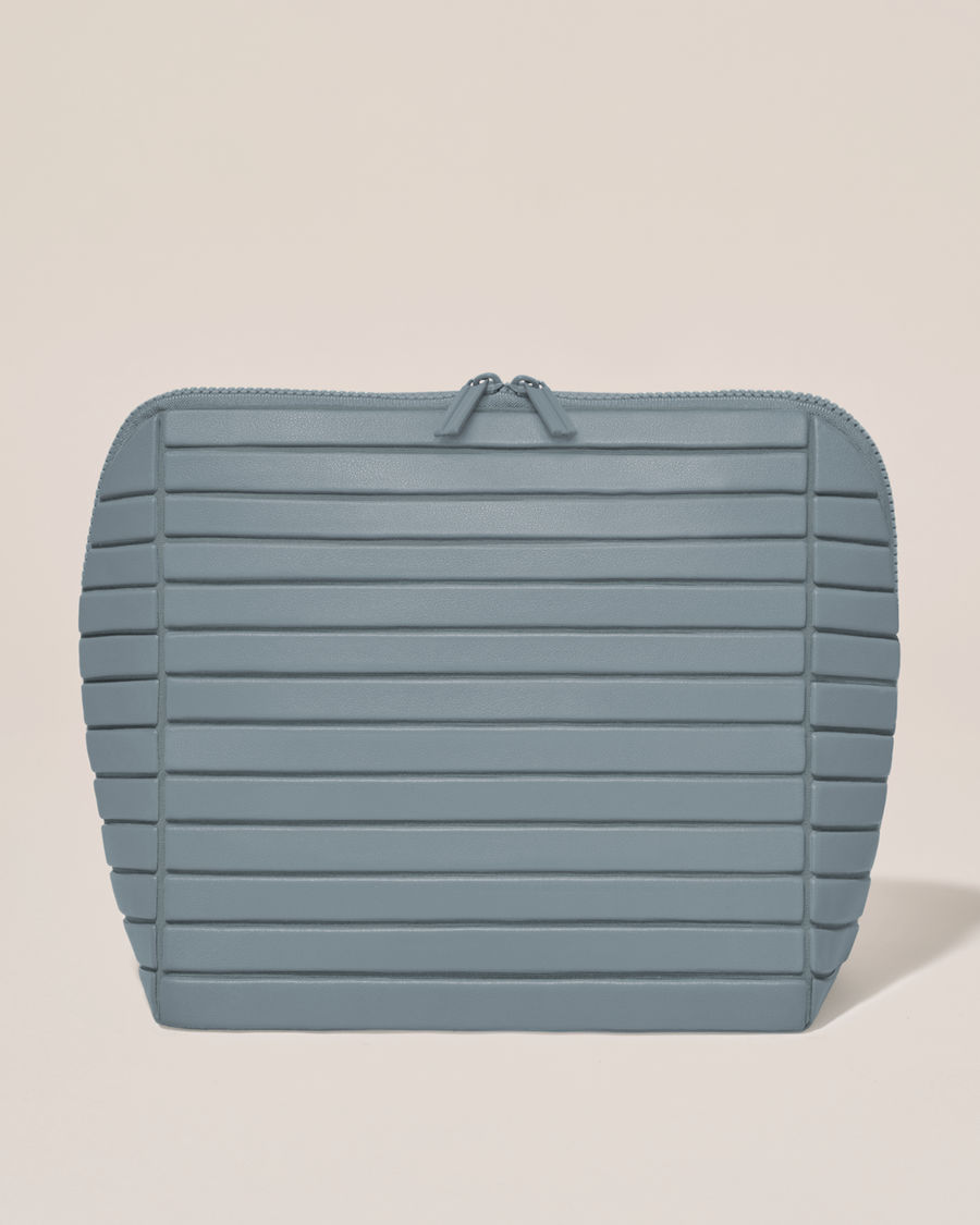 Closed Afform Large Slate (blue) Traveller makeup bag with structured horizontal bar design