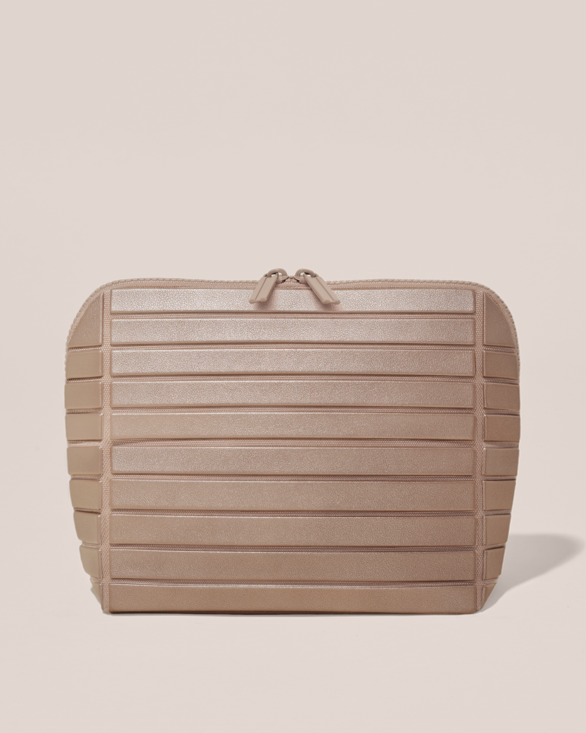 Closed Afform Medium Bronze Traveller makeup bag with structured horizontal bar design