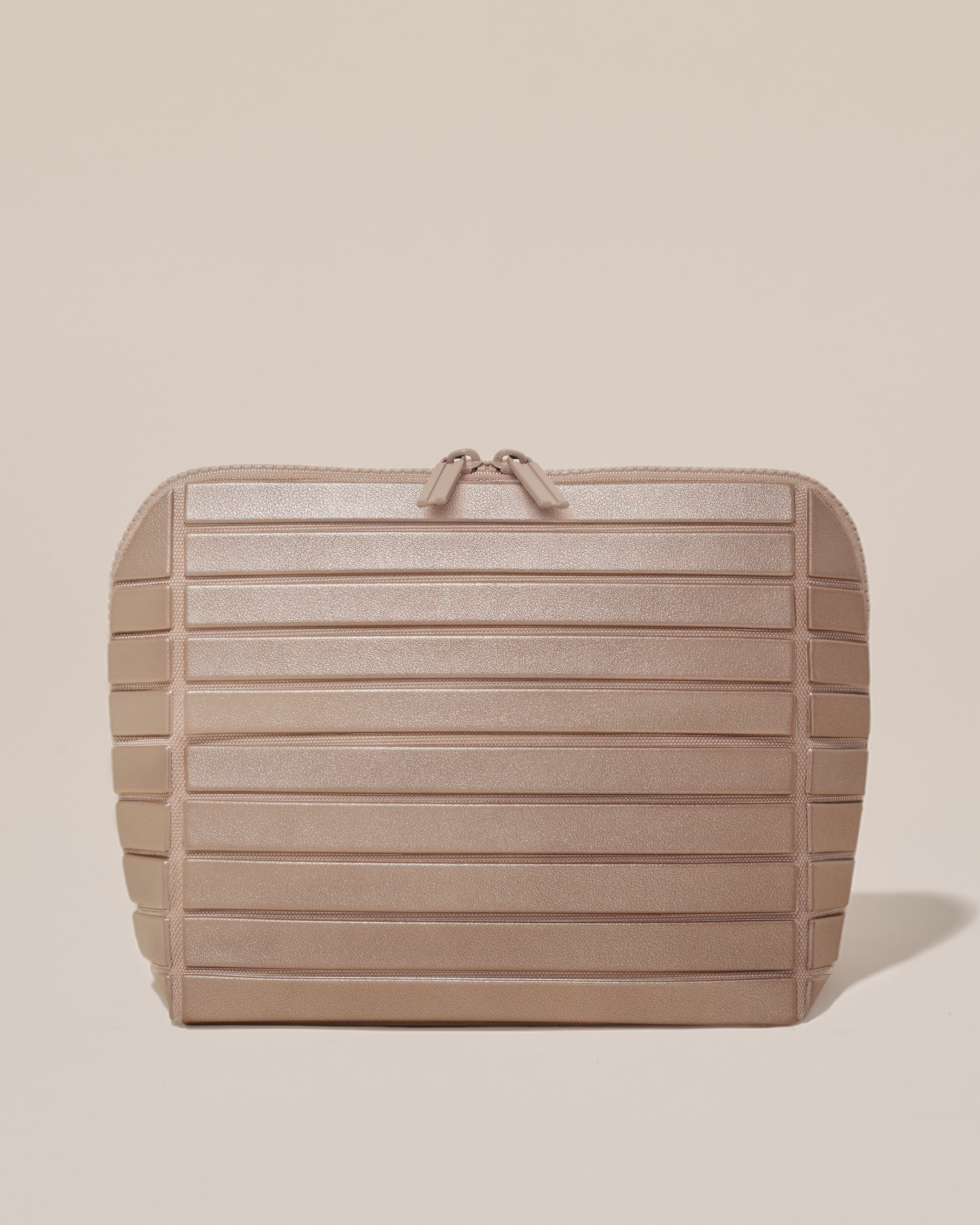 Closed Afform Medium Bronze Traveller makeup bag with structured horizontal bar design