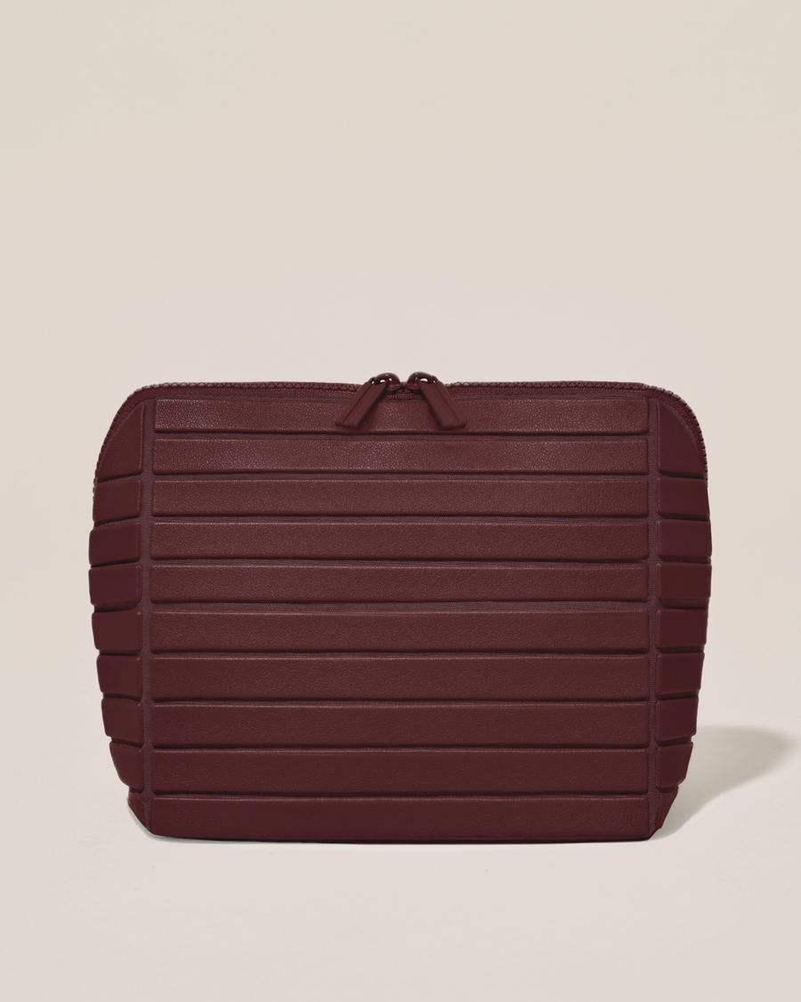 Closed Afform Medium Cassis (maroon) Traveller makeup bag with structured horizontal bar design