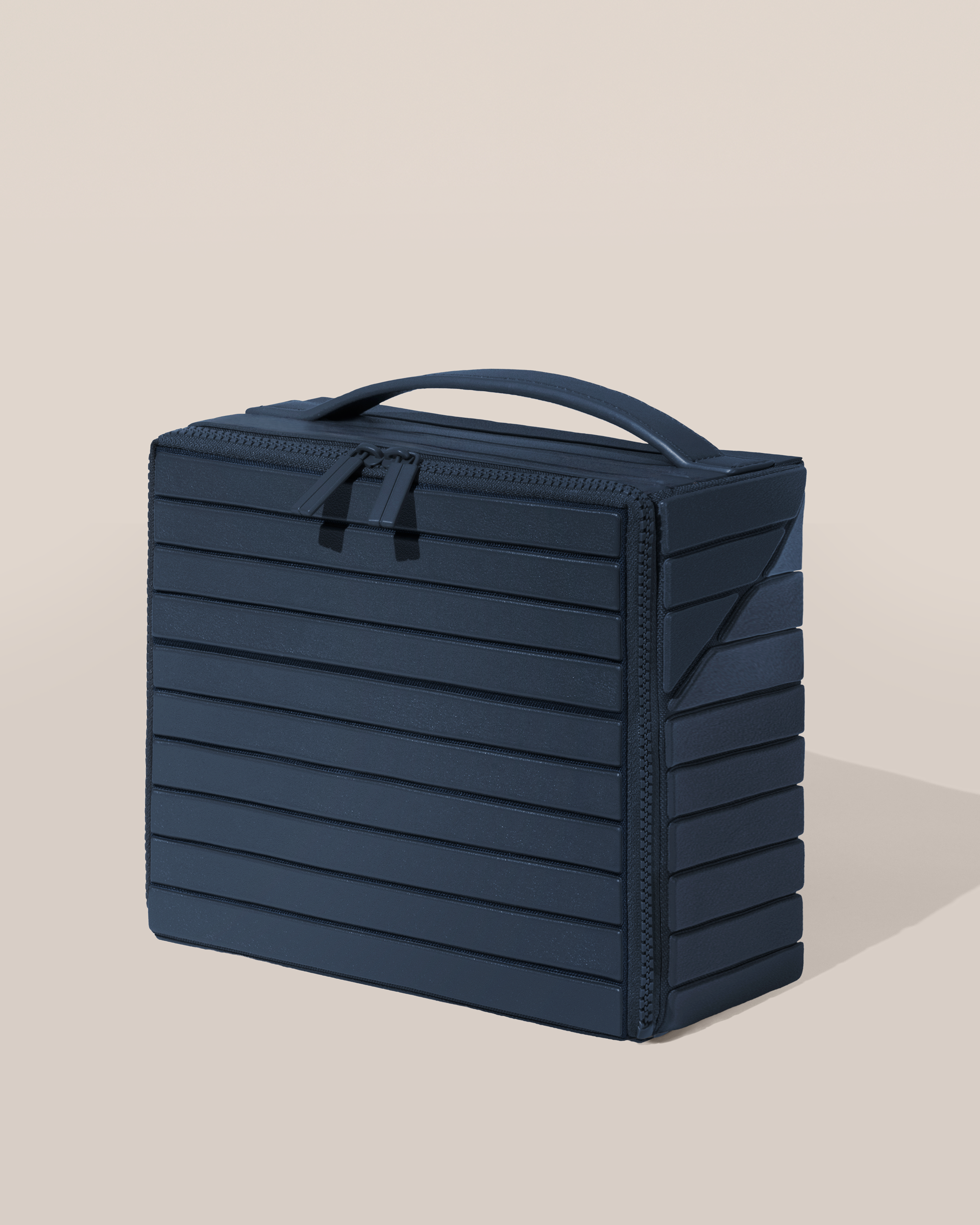 Closed Afform Medium Indigo (blue) Kit toiletry bag with a compact, zip-around design and top handle for elevated everyday or travel organization