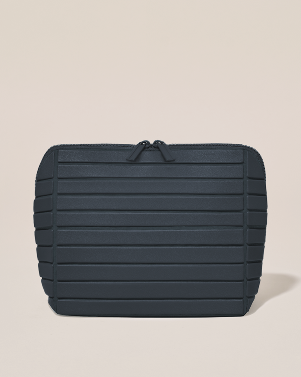 Closed Afform Medium Indigo (navy) Traveller makeup bag with structured horizontal bar design