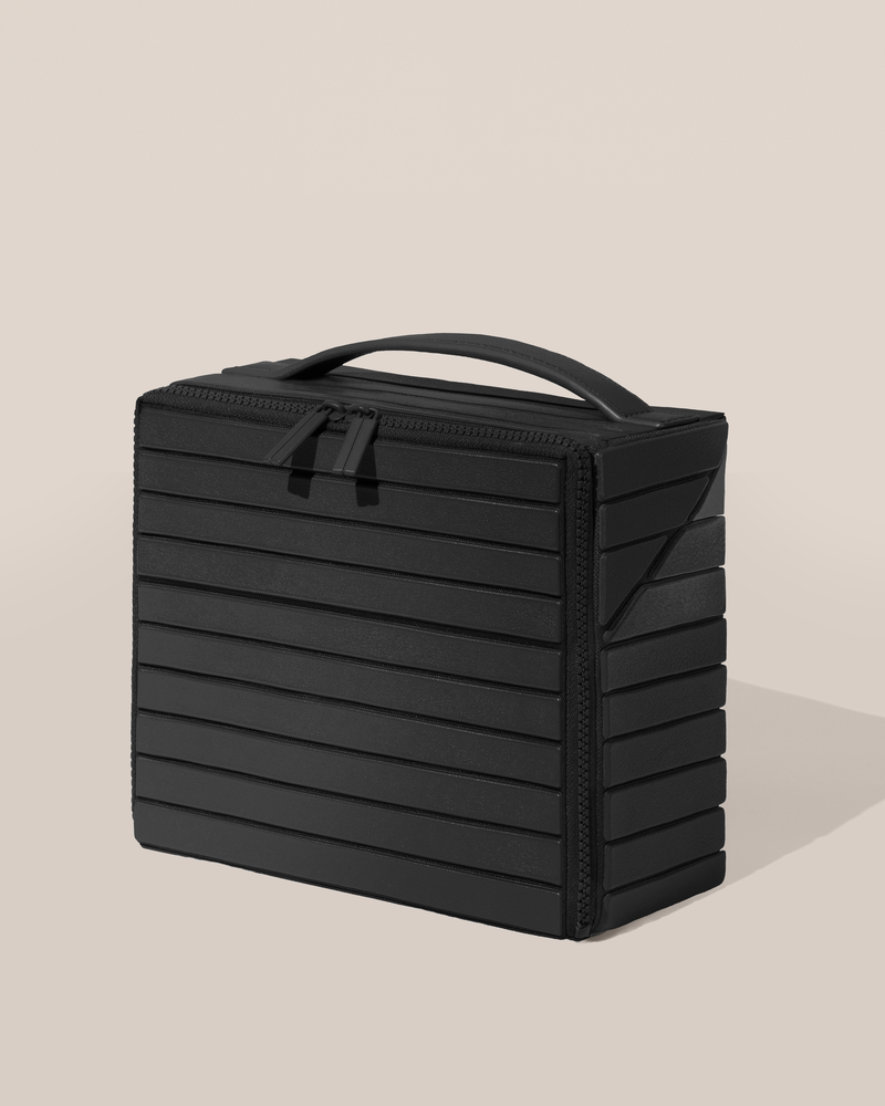 Closed Afform Medium Onyx (black) Kit toiletry bag with a compact, zip-around design and top handle for elevated everyday or travel organization