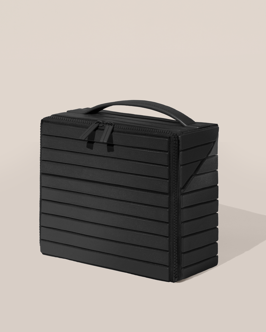 Closed Afform Medium Onyx (black) Kit toiletry bag with a compact, zip-around design and top handle for elevated everyday or travel organization