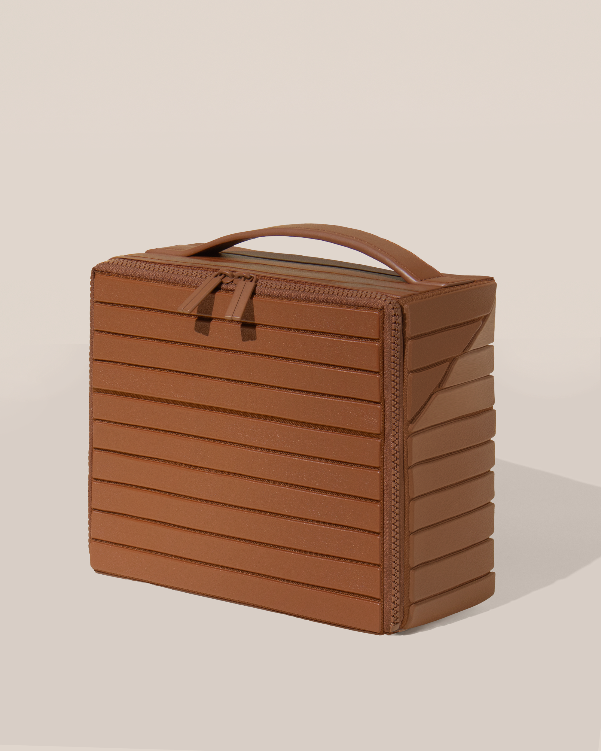 Closed Afform Medium Vicuna (brown) Kit toiletry bag with a compact, zip-around design and top handle for elevated everyday or travel organization