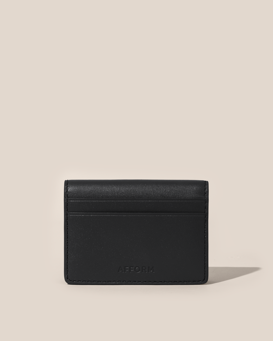 Back of the Afform Onyx Card Case showing an exterior slip pocket and embossed Afform logo