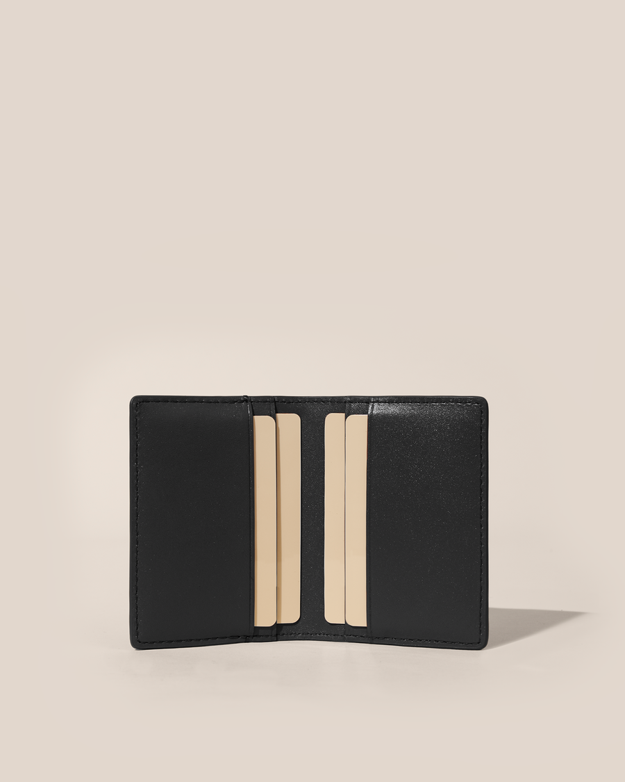 Open Afform Onyx Card Case showing four interior card slots holding cards