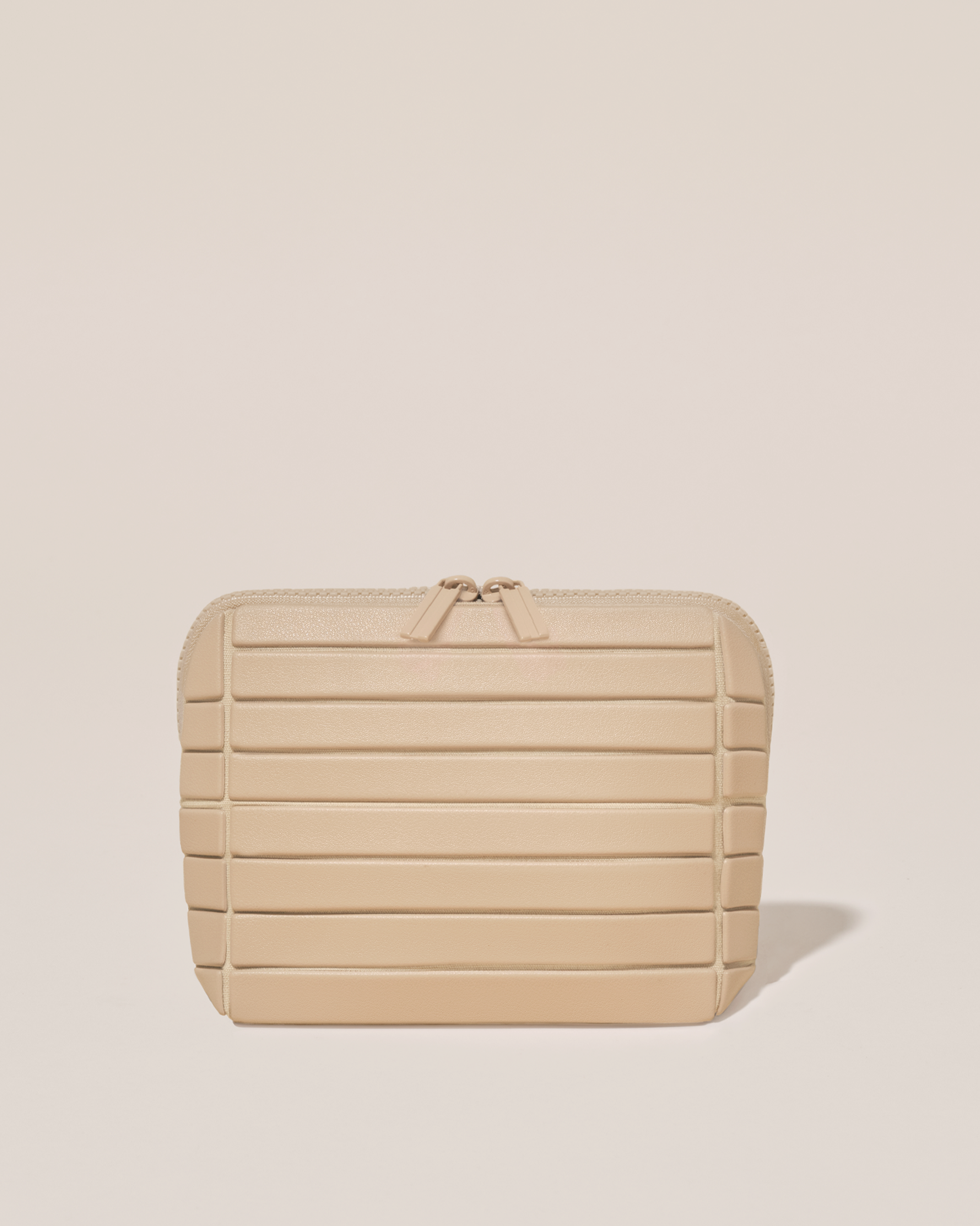Closed Afform Small Bisque (white) Traveller makeup bag with structured horizontal bar design
