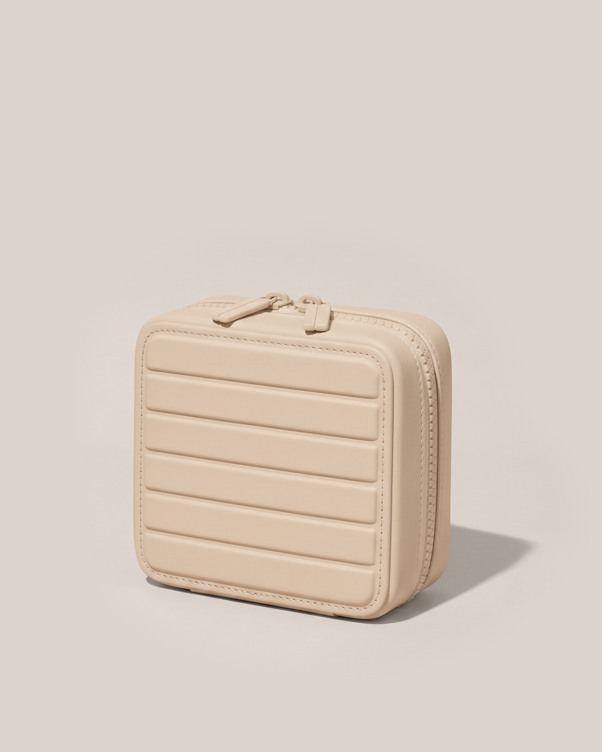 Closed Afform Small Bisque (white) Vault jewelry case with a compact, zip-around design for elevated jewelry organization