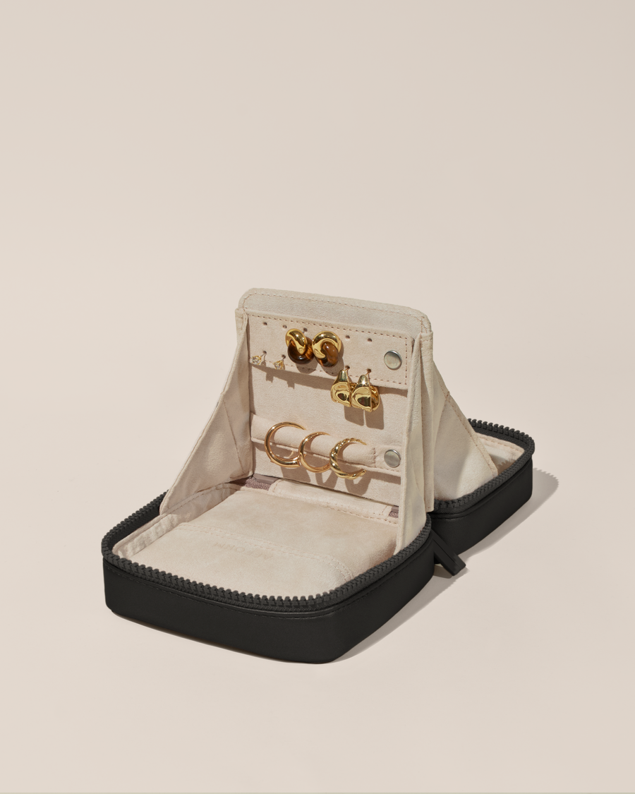 Open Afform Small Onyx (black) Vault, shown open and packed with rings and earrings on respective removable ring and earring bars. 