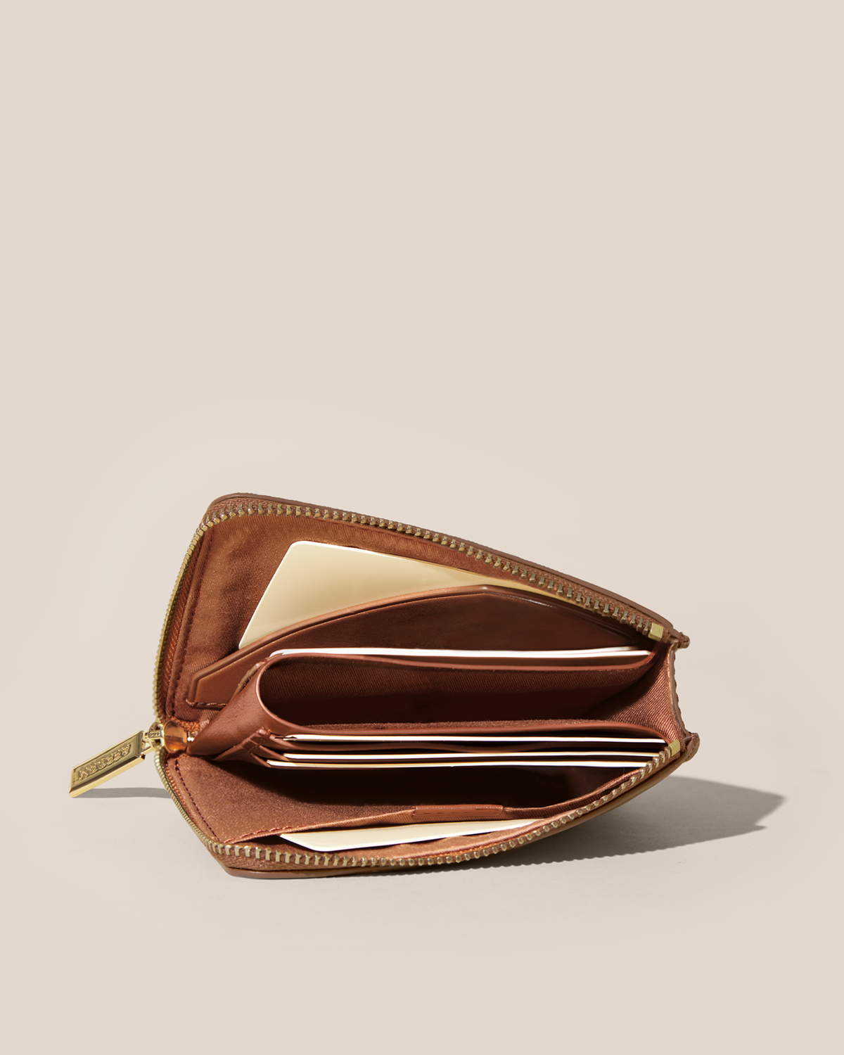 Fully open Afform Vicuna Zip Wallet showing multiple card slots and a full-length bill compartment