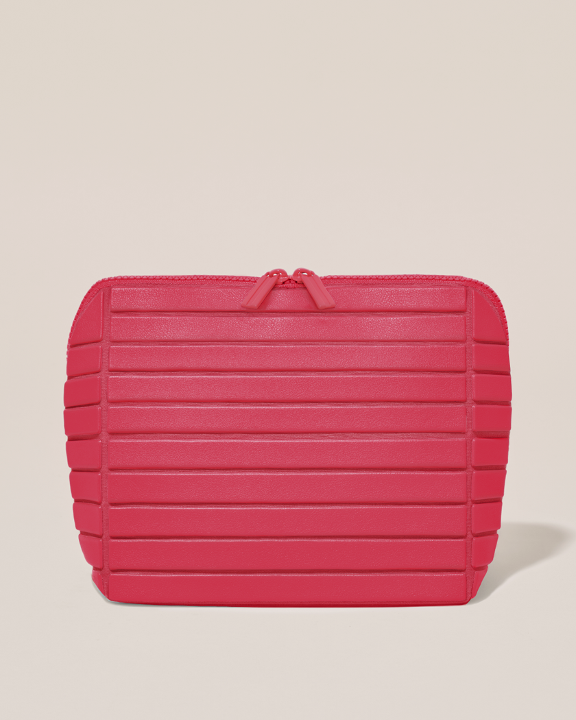 Closed Parallelle Medium Tart (hot pink) Traveller makeup bag with structured horizontal bar design