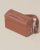 Video of the Afform Vicuna Crossbody bag being unzipped to reveal sunglasses, card holder, and interior pockets